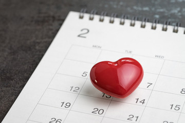 Fototapeta na wymiar Valentines day concept red lovely heart on 14 Feb calendar
