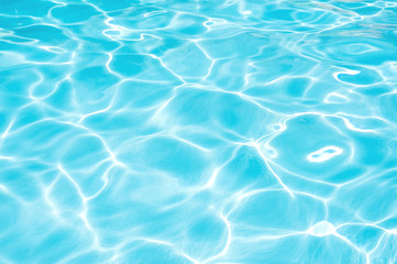 Fototapeta na wymiar Wonderful blue and bright ripple water and surface in swimming pool, Beautiful motion gentle wave in pool