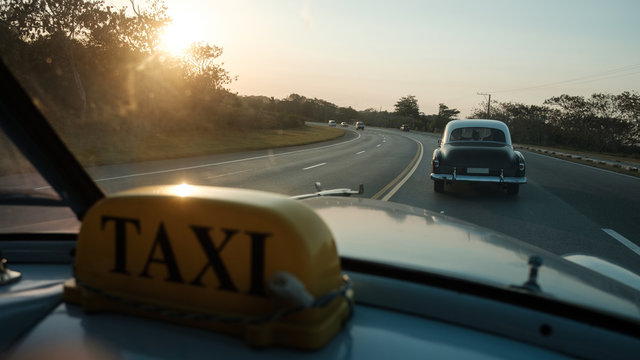 Taxi Sign Inside Of The Car