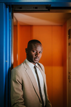 Elegant african businessman in the elevator