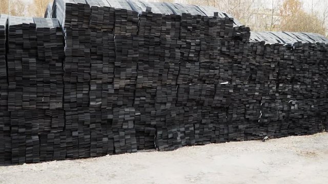Stacks of geogrid on pallets on the stock of the plant.