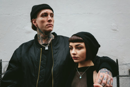 Attractive punk couple around london.