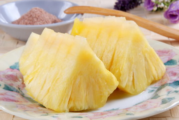 Fresh slice pineapple on a plate 