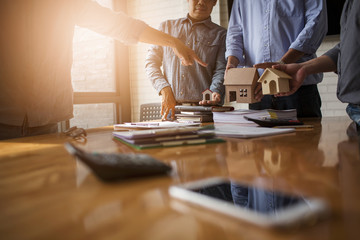 Business meetings of real estate brokers and company presidents to select a model to build a housing estate in writing and presenting to state organizations.