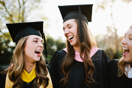 Female Graduates Smiling