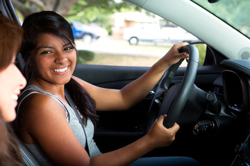 Friends driving taking a road trip.