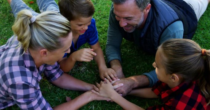 Happy family having fun in park 
