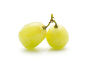 Two grape berries (Early Sweet or Grapaes variety) isolated on white background green ripe.