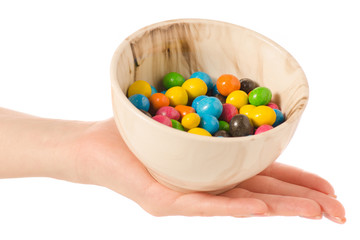 Bucket Nuts in a multi-colored glaze dragee  in hand