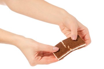 Obraz premium Chocolate cake candy biscuit milk in hand