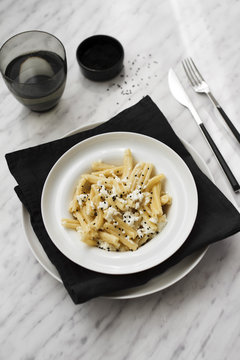 Pasta with ricotta cheese and black cumin