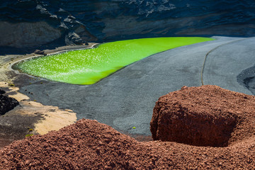 Volcanic green lake (El Lago Verde, Charco de los Clicos) in El Golfo. Lanzarote. Canary Islands. Spain © alexanderkonsta