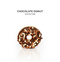 Creative layout made of chocolate donut. Flat lay. Food concept. Macro  concept.