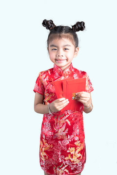 Little Girl Holding Red Packet Money With Chinese New Year On White Backgroud