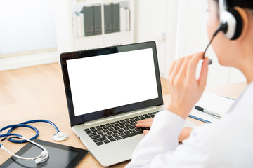 selective focus of female doctor wearing headphone