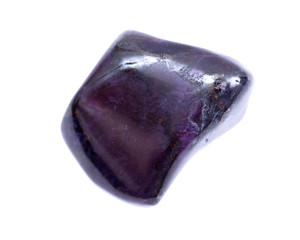 Deep purple Manganese with sugilite tumbled stone from South Africa isolated on white background