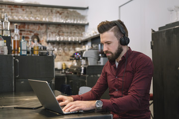Cheerful man at the laptop