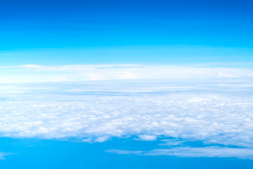 Fototapeta premium Blue sky and Cloud Top view from airplane window,Nature background.