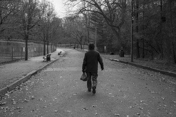 man walking behind