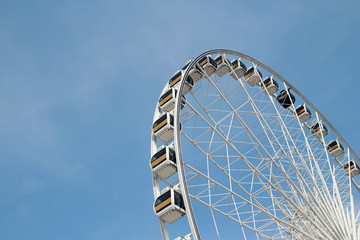 ferris wheel on blue sky