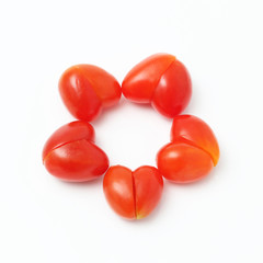Heart ring shaped tomato on white background