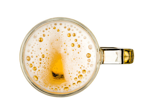 Mug of beer with bubble on glass isolated on white background celebration object design top view