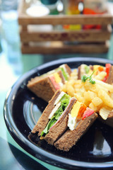Club sandwich , Sandwich with chicken tomato chicken bacon and vegetable