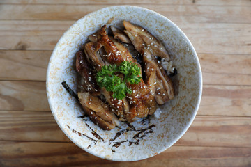 japanese food , Chicken teriyoki with rice on wood background
