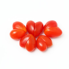 Heart ring shaped tomato on white background