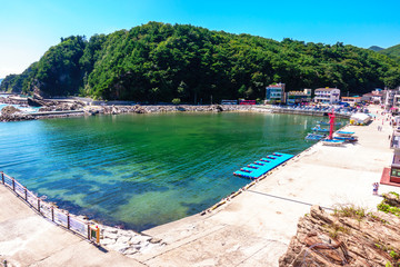 Beautiful red lighthouse Jeongdong-Simgok Port