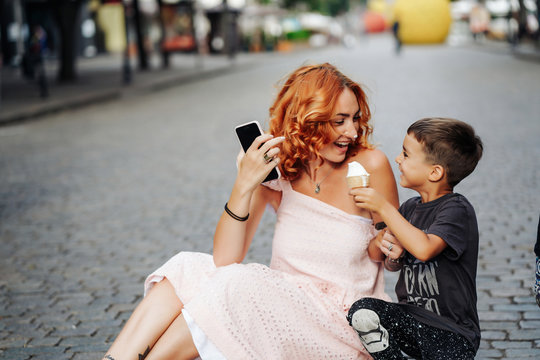 Mom And Son Eat Ice Cream Together