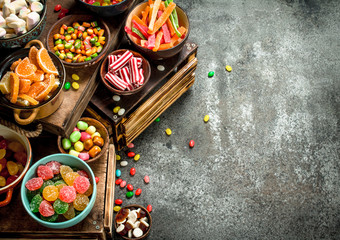 Various sweets, candies, jelly, marshmallows and candied fruits.