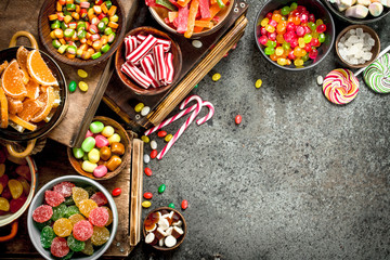 Various sweets, candies, jelly, marshmallows and candied fruits.