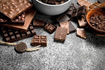 Different kinds of chocolate in bowls.