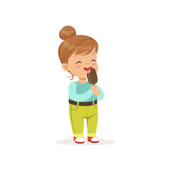 Happy little girl eating delicious chocolate ice-cream on stick. Cartoon child character with brown hair in blue blouse and green pants with belt. Flat vector design