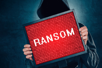 Ransomware computer virus concept, hacker with monitor