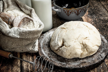 Fresh dough with ingredients.