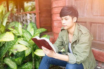 Man reading from the holy bible, close up.Reading Holy Bible in church concept for faith, spirituality and religion