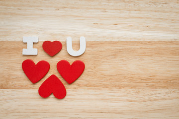 Love heart Valentine on a wooden background.