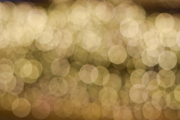 bokeh of gold light bulb