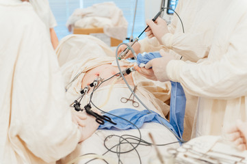 Team surgeon at work in operating room