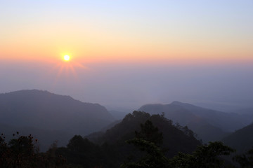 top hills and sunrise at Doi Ang Khang. Composition of the nature at Chiangmai Thailand