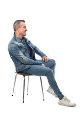 man sitting on a chair with white background