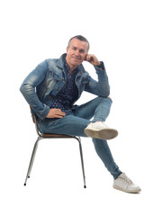 man sitting on a chair with white background