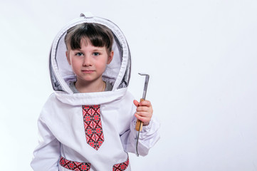 A little girl wears an over sized bee suit in studio white background.