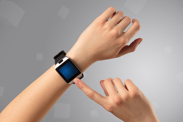 Female hand wearing smartwatch