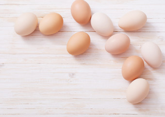 eggs on white wooden background