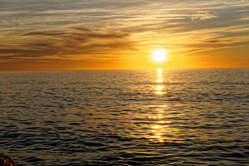 sunrise at the edge of the mediterranean sea