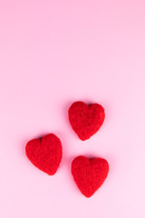 Fototapeta premium red hearts on rosa background