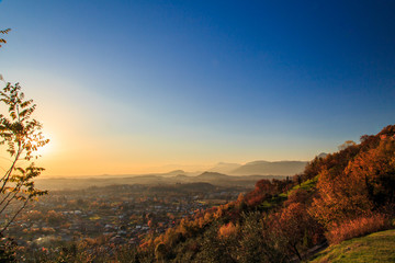 colorful autumn sunset in the italian countryside